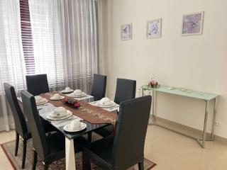 Well-appointed dining room with a large table and comfortable chairs