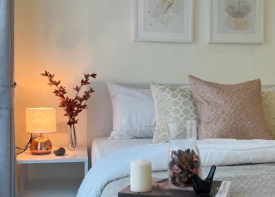 Cozy bedroom with stylish decor and soft lighting