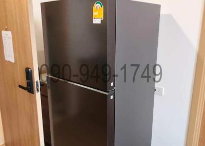 Modern refrigerator in a compact residential building space