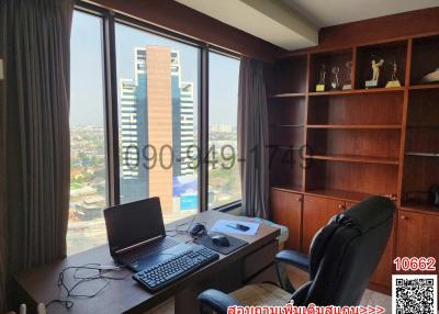 Home office with a view of the city