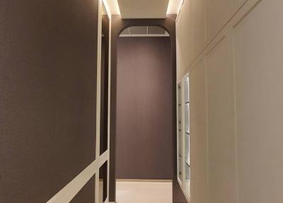 Modern hallway interior with sleek finishes and ambient lighting