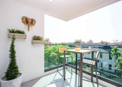Luxurious 2-Bed Condo in Natura Green Residence: Coffee, Cuisine, and Elegance
