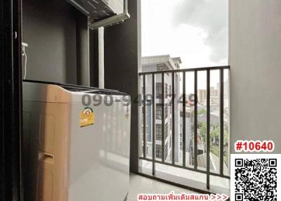 Compact balcony with city view and railing
