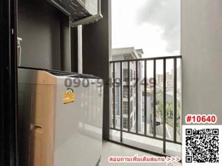 Compact balcony with city view and railing