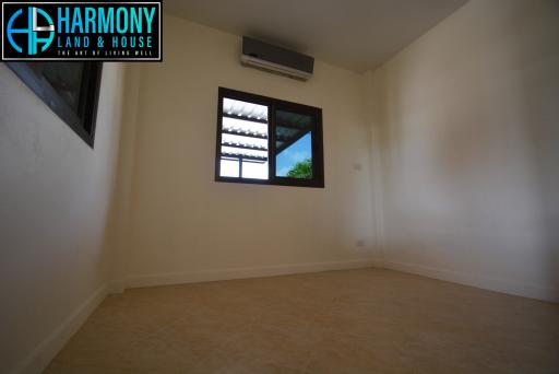 Minimalist Bedroom Interior with Air Conditioning Unit