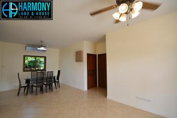 Spacious dining area with ceiling fan and natural light