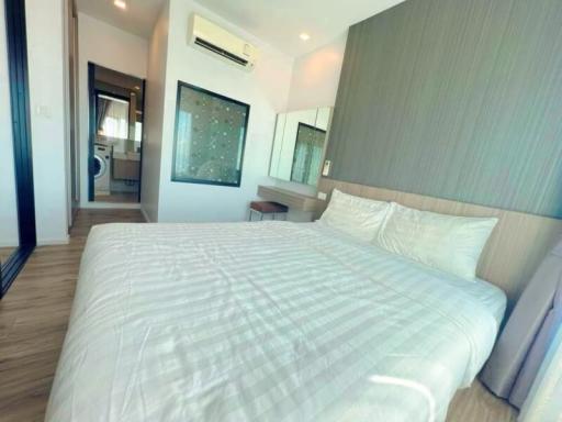 Spacious bedroom with modern design and en-suite bathroom