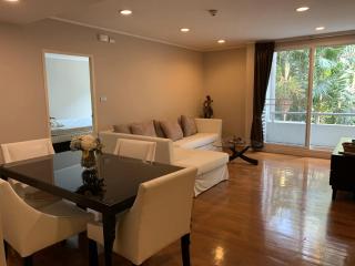 Spacious living room with comfortable seating and natural light