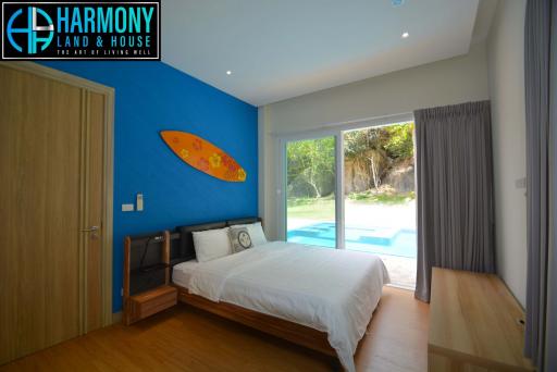 Bright bedroom with direct pool access