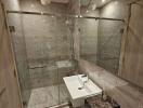 Modern bathroom with glass shower and marble tiles