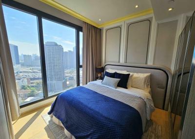 Cozy Bedroom with Large Windows and City View