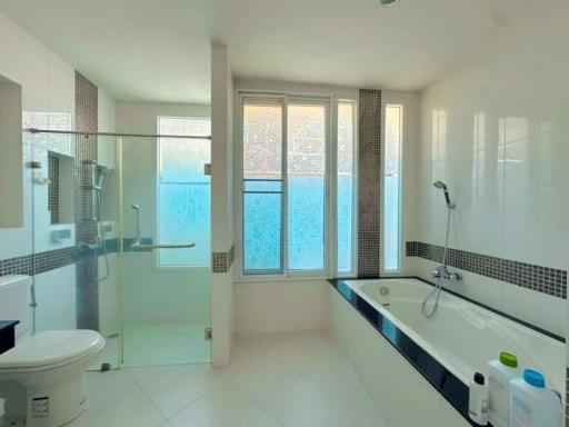 Modern Bathroom with Glass Shower and Bathtub