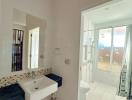 Bright bathroom with shower and outdoor access