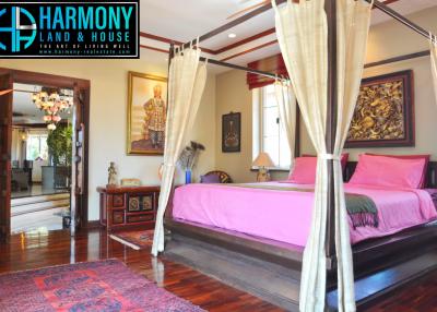 Elegant bedroom with traditional decor and hardwood floors