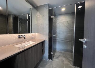 Modern bathroom with glass shower and vanity