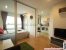 Compact and modern studio apartment interior with integrated living space