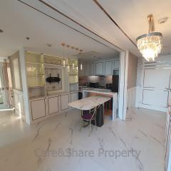 Modern kitchen with marble flooring and central island