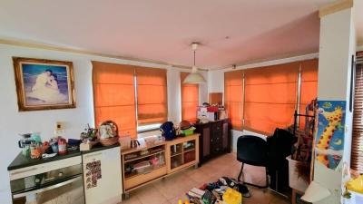 Spacious living room with natural light and warmth