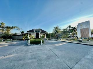 Wide-angle view of a building entrance with clear skies