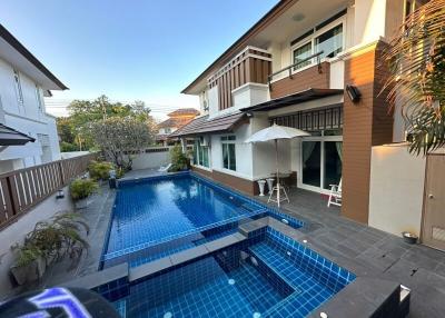 Luxury house with swimming pool in backyard