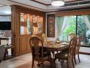 Elegant dining room with natural light and traditional wood furniture