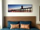 Cozy bedroom interior with artwork above the bed