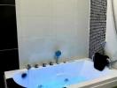 Modern bathroom with a jacuzzi tub and LED lighting