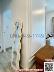 Modern minimalistic bedroom interior with stylish wall and elegant furnishings