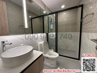 Modern bathroom with glass shower enclosure