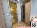 Corridor with wooden doors leading to different rooms and bathroom