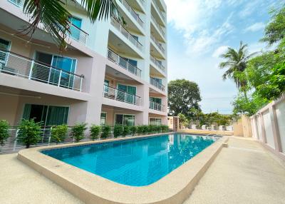 Modern apartment building with swimming pool