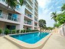 Modern apartment building with swimming pool