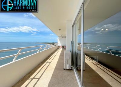 Spacious balcony with ocean view and clear blue sky