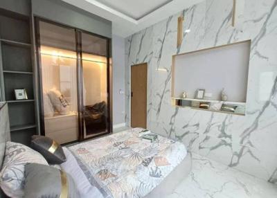 Elegant bedroom with marble floors and modern furnishing