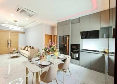 Modern open plan living and dining area with kitchen