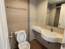 Modern bathroom interior with tiled walls and floors