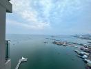 Panoramic sea view from high-rise apartment balcony