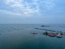 Aerial view of a coastal area with boats and piers