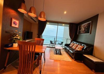 Cozy modern living room with natural light and balcony access