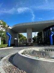 Modern building entrance with unique blue sculptures