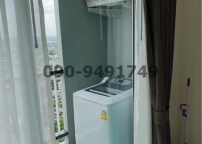 Compact utility area with washing machine and air conditioning unit