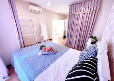 Cozy bedroom with modern decor and en-suite bathroom