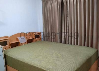 Modern furnished bedroom with air conditioning unit