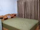 Modern furnished bedroom with air conditioning unit