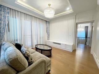 Spacious and elegant living room with natural light