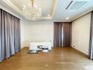 Elegant living room with chandelier and hardwood floors