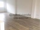Spacious unfurnished living room with tiled flooring