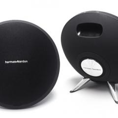 Two harman/kardon speakers on a white background