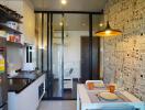 Modern kitchen with patterned wallpaper and sleek design