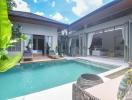 Luxurious poolside outdoor living area with open patio doors